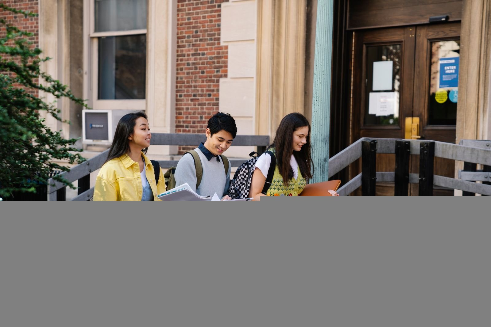 Graduates outside a University of London campus