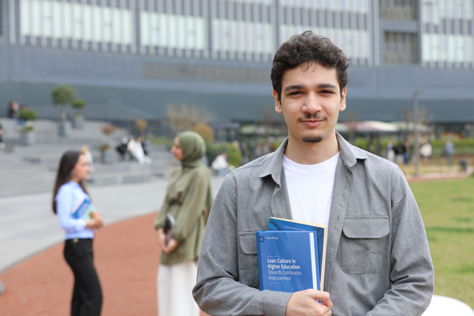 Diverse students attending a university lecture